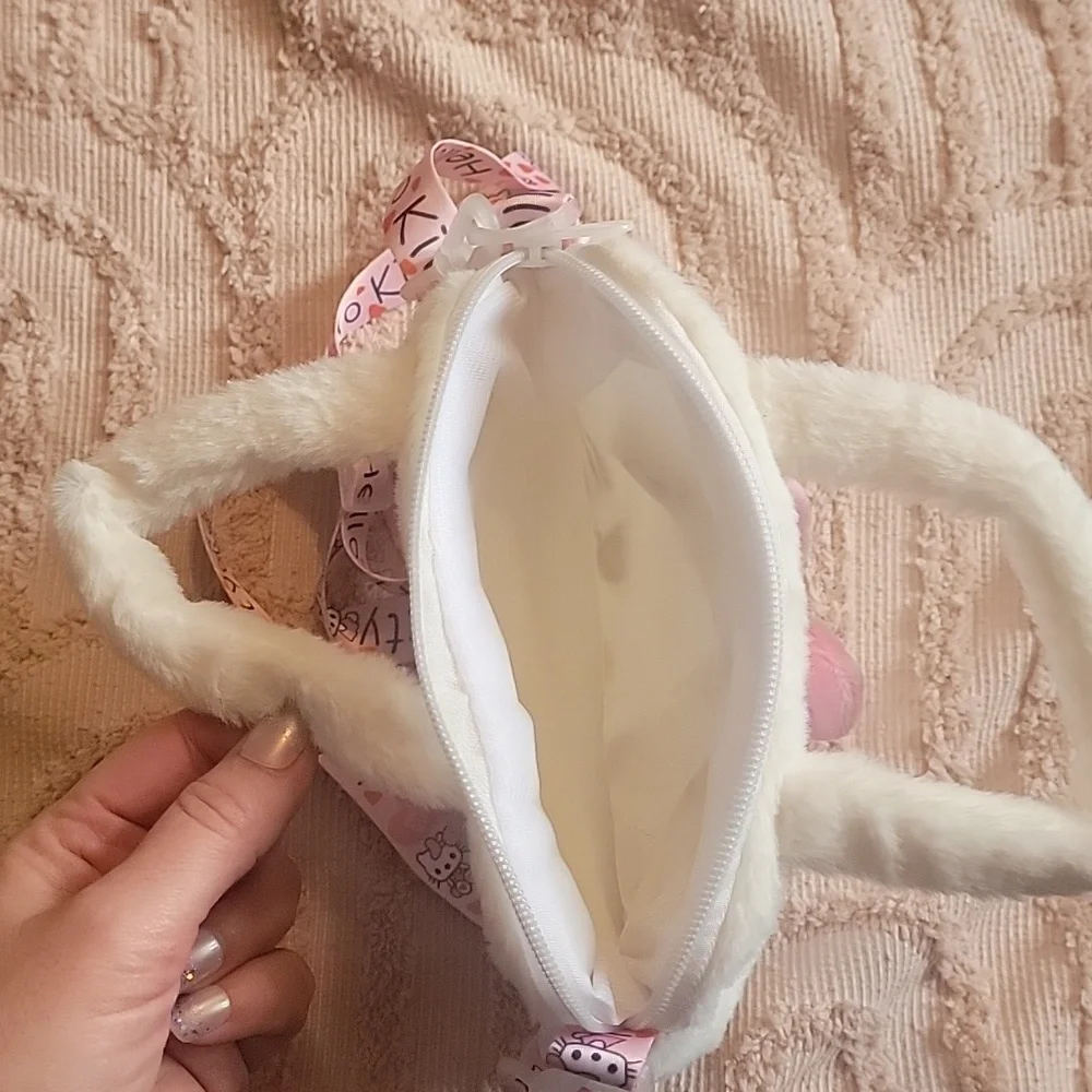 Hello Kitty Handbag with adjustable shoulder strap. White with pink bow. NWOT